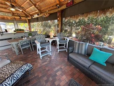 Welcome to this tropical sanctuary, where luxury and attention on St. Lucie Trail Golf Club in Florida - for sale on GolfHomes.com, golf home, golf lot