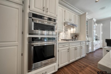 Welcome to this absolutely stunning 4-bedroom, 3.5-bath home on Hollytree Country Club in Texas - for sale on GolfHomes.com, golf home, golf lot