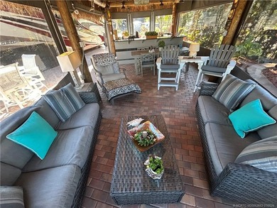 Welcome to this tropical sanctuary, where luxury and attention on St. Lucie Trail Golf Club in Florida - for sale on GolfHomes.com, golf home, golf lot