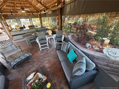 Welcome to this tropical sanctuary, where luxury and attention on St. Lucie Trail Golf Club in Florida - for sale on GolfHomes.com, golf home, golf lot