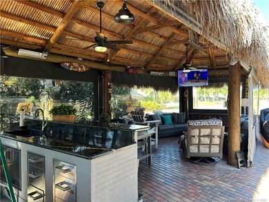 Welcome to this tropical sanctuary, where luxury and attention on St. Lucie Trail Golf Club in Florida - for sale on GolfHomes.com, golf home, golf lot