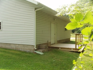 (351/PB) Cherry! Best describes this 3-bedroom, 2-bath home on on Prentice Golf Club in Wisconsin - for sale on GolfHomes.com, golf home, golf lot