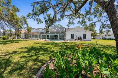 Welcome to this spacious pool home, situated in the Seven Hills on Oak Hills Country Club in Florida - for sale on GolfHomes.com, golf home, golf lot