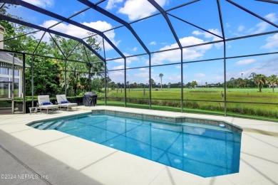 This beautiful estate home in prestigious Marsh Landing Country on Marsh Landing Country Club - Saint Johns County in Florida - for sale on GolfHomes.com, golf home, golf lot