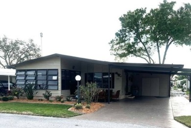 This home is in a 55 plus community with a monthly lot rent of on Crystal Lake Club in Florida - for sale on GolfHomes.com, golf home, golf lot