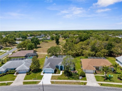 Welcome to this spacious pool home, situated in the Seven Hills on Oak Hills Country Club in Florida - for sale on GolfHomes.com, golf home, golf lot