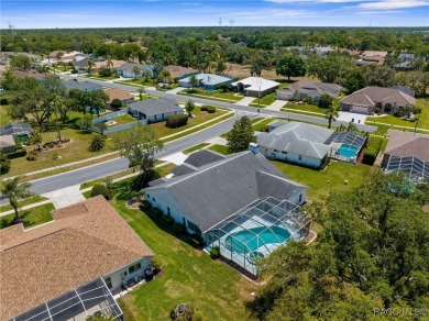 Welcome to this spacious pool home, situated in the Seven Hills on Oak Hills Country Club in Florida - for sale on GolfHomes.com, golf home, golf lot