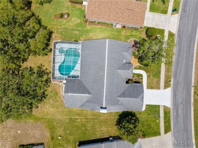 Welcome to this spacious pool home, situated in the Seven Hills on Oak Hills Country Club in Florida - for sale on GolfHomes.com, golf home, golf lot