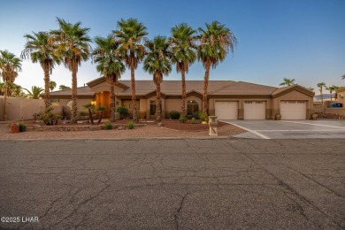 Welcome to 2175 Palmer Drive, Luxury living on the green in the on London Bridge Golf Course in Arizona - for sale on GolfHomes.com, golf home, golf lot