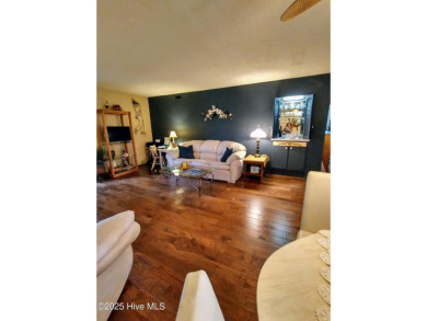 Lovely updated golf front condo is available in Foxfire Village on Foxfire Golf and Country Club in North Carolina - for sale on GolfHomes.com, golf home, golf lot