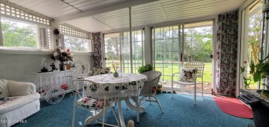 Lovely updated golf front condo is available in Foxfire Village on Foxfire Golf and Country Club in North Carolina - for sale on GolfHomes.com, golf home, golf lot
