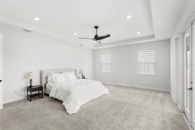 Welcome to 8210 Topsail - a stunning Toll Brothers Madeira floor on Orange County National Golf Center and Lodge in Florida - for sale on GolfHomes.com, golf home, golf lot