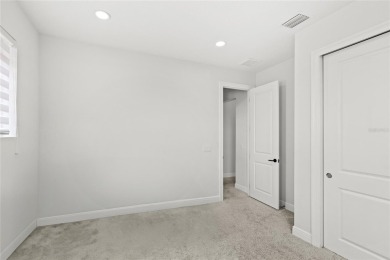 Welcome to 8210 Topsail - a stunning Toll Brothers Madeira floor on Orange County National Golf Center and Lodge in Florida - for sale on GolfHomes.com, golf home, golf lot
