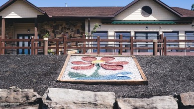 Escape to this charming chalet located in the Hideout a on The Hideout Golf in Pennsylvania - for sale on GolfHomes.com, golf home, golf lot