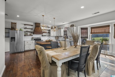 The Beautiful *COTTAGE ON THE COURSE* can now be yours. Located on Inverness Country Club in Alabama - for sale on GolfHomes.com, golf home, golf lot