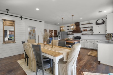 The Beautiful *COTTAGE ON THE COURSE* can now be yours. Located on Inverness Country Club in Alabama - for sale on GolfHomes.com, golf home, golf lot