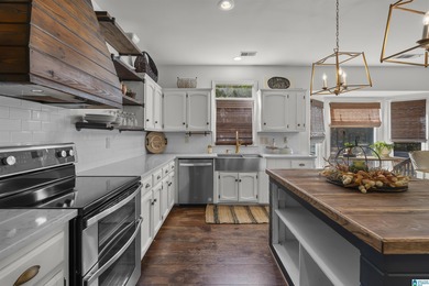 The Beautiful *COTTAGE ON THE COURSE* can now be yours. Located on Inverness Country Club in Alabama - for sale on GolfHomes.com, golf home, golf lot