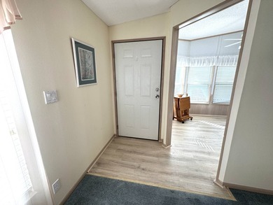 Discover this well maintained manufactured home located in the on Schalamar Creek Golf and Country Club in Florida - for sale on GolfHomes.com, golf home, golf lot