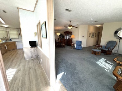 Discover this well maintained manufactured home located in the on Schalamar Creek Golf and Country Club in Florida - for sale on GolfHomes.com, golf home, golf lot