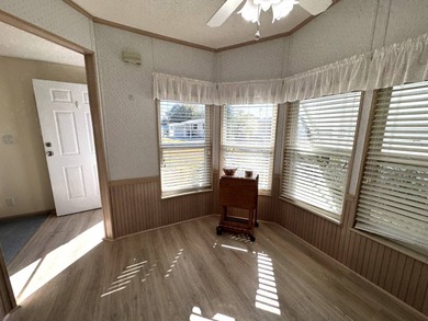 Discover this well maintained manufactured home located in the on Schalamar Creek Golf and Country Club in Florida - for sale on GolfHomes.com, golf home, golf lot