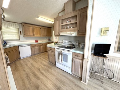 Discover this well maintained manufactured home located in the on Schalamar Creek Golf and Country Club in Florida - for sale on GolfHomes.com, golf home, golf lot