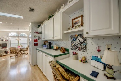 This beautiful two-bedroom, two-bath plus den home is located in on Pine Lakes Country Club in Florida - for sale on GolfHomes.com, golf home, golf lot
