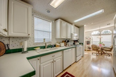This beautiful two-bedroom, two-bath plus den home is located in on Pine Lakes Country Club in Florida - for sale on GolfHomes.com, golf home, golf lot