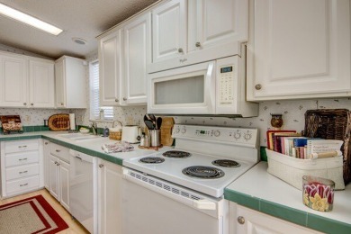This beautiful two-bedroom, two-bath plus den home is located in on Pine Lakes Country Club in Florida - for sale on GolfHomes.com, golf home, golf lot