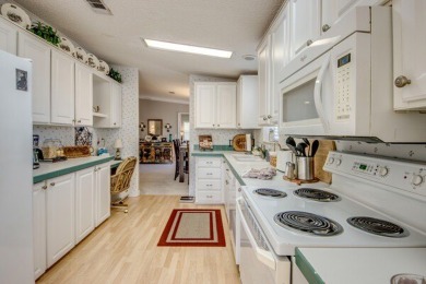 This beautiful two-bedroom, two-bath plus den home is located in on Pine Lakes Country Club in Florida - for sale on GolfHomes.com, golf home, golf lot