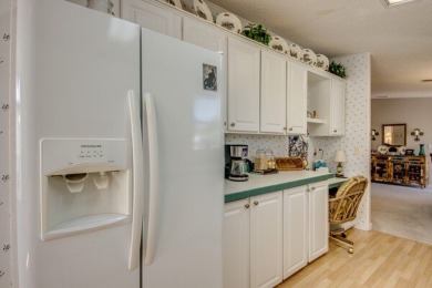 This beautiful two-bedroom, two-bath plus den home is located in on Pine Lakes Country Club in Florida - for sale on GolfHomes.com, golf home, golf lot