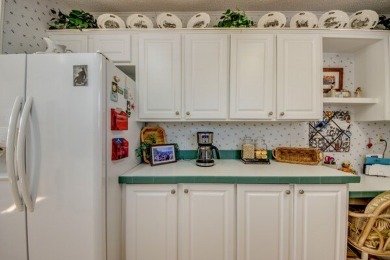 This beautiful two-bedroom, two-bath plus den home is located in on Pine Lakes Country Club in Florida - for sale on GolfHomes.com, golf home, golf lot