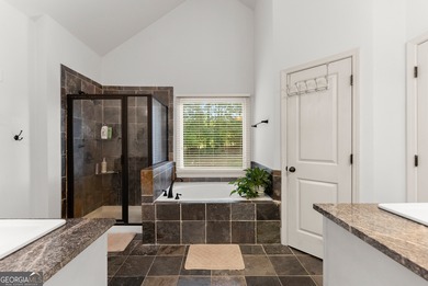 Welcome home to this stunning 5-bedroom, 3.5-bathroom gem on Traditions of Braselton Golf Club in Georgia - for sale on GolfHomes.com, golf home, golf lot