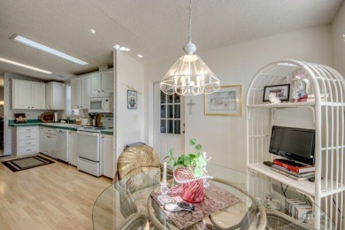 This beautiful two-bedroom, two-bath plus den home is located in on Pine Lakes Country Club in Florida - for sale on GolfHomes.com, golf home, golf lot