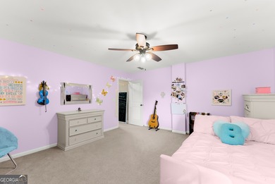 Welcome home to this stunning 5-bedroom, 3.5-bathroom gem on Traditions of Braselton Golf Club in Georgia - for sale on GolfHomes.com, golf home, golf lot