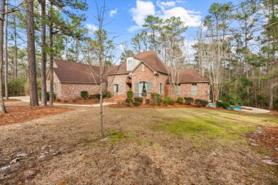 Nestled in the middle of two spacious lots in the Canebrake Golf on Canebrake Country Club in Mississippi - for sale on GolfHomes.com, golf home, golf lot