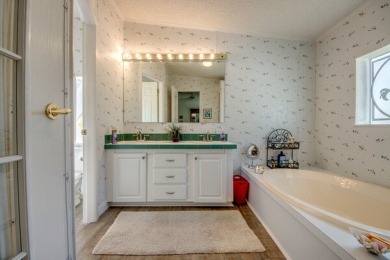 This beautiful two-bedroom, two-bath plus den home is located in on Pine Lakes Country Club in Florida - for sale on GolfHomes.com, golf home, golf lot
