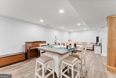 Welcome home to this stunning 5-bedroom, 3.5-bathroom gem on Traditions of Braselton Golf Club in Georgia - for sale on GolfHomes.com, golf home, golf lot