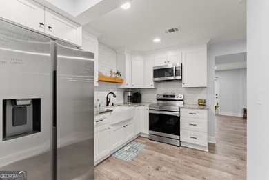 Welcome home to this stunning 5-bedroom, 3.5-bathroom gem on Traditions of Braselton Golf Club in Georgia - for sale on GolfHomes.com, golf home, golf lot