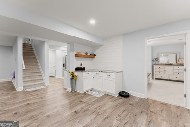 Welcome home to this stunning 5-bedroom, 3.5-bathroom gem on Traditions of Braselton Golf Club in Georgia - for sale on GolfHomes.com, golf home, golf lot