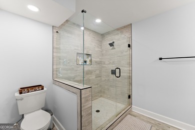 Welcome home to this stunning 5-bedroom, 3.5-bathroom gem on Traditions of Braselton Golf Club in Georgia - for sale on GolfHomes.com, golf home, golf lot