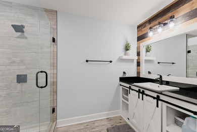 Welcome home to this stunning 5-bedroom, 3.5-bathroom gem on Traditions of Braselton Golf Club in Georgia - for sale on GolfHomes.com, golf home, golf lot