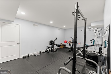 Welcome home to this stunning 5-bedroom, 3.5-bathroom gem on Traditions of Braselton Golf Club in Georgia - for sale on GolfHomes.com, golf home, golf lot