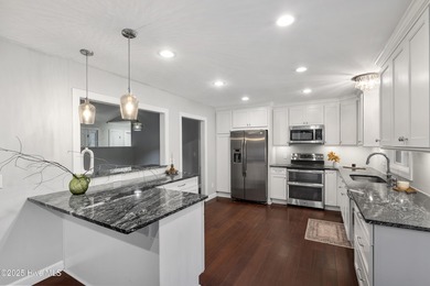 Tucked away among the lovely trees, this brick ranch is nestled on Southern Pines Country Club in North Carolina - for sale on GolfHomes.com, golf home, golf lot