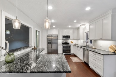 Tucked away among the lovely trees, this brick ranch is nestled on Southern Pines Country Club in North Carolina - for sale on GolfHomes.com, golf home, golf lot