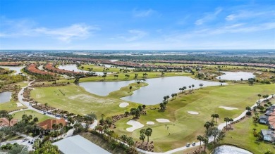 Nestled in the exclusive Sarasota National Golf and Country Club on Sarasota National Golf Club in Florida - for sale on GolfHomes.com, golf home, golf lot