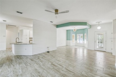 One or more photos have been virtually staged.    GREAT PRICE on Poinciana Golf Club in Florida - for sale on GolfHomes.com, golf home, golf lot