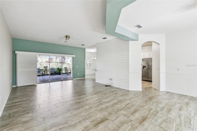 One or more photos have been virtually staged.    GREAT PRICE on Poinciana Golf Club in Florida - for sale on GolfHomes.com, golf home, golf lot
