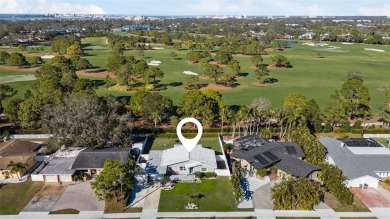 Stunning Belleair home nestled with a view of the 16th Fairway on Belleview Biltmore Golf Club in Florida - for sale on GolfHomes.com, golf home, golf lot