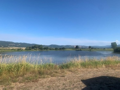 This Meadowcreek treasure spans .8 acres and is beautifully on Meadowcreek Golf Resort in Idaho - for sale on GolfHomes.com, golf home, golf lot