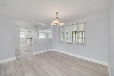This COMPLETELY Remodeled home is in the waterfront community of on Gulf Harbors Golf Course in Florida - for sale on GolfHomes.com, golf home, golf lot